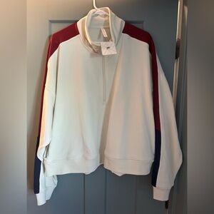 NWT fabletics cropped half zip sweatshirt with red and navy detail on the sleeve